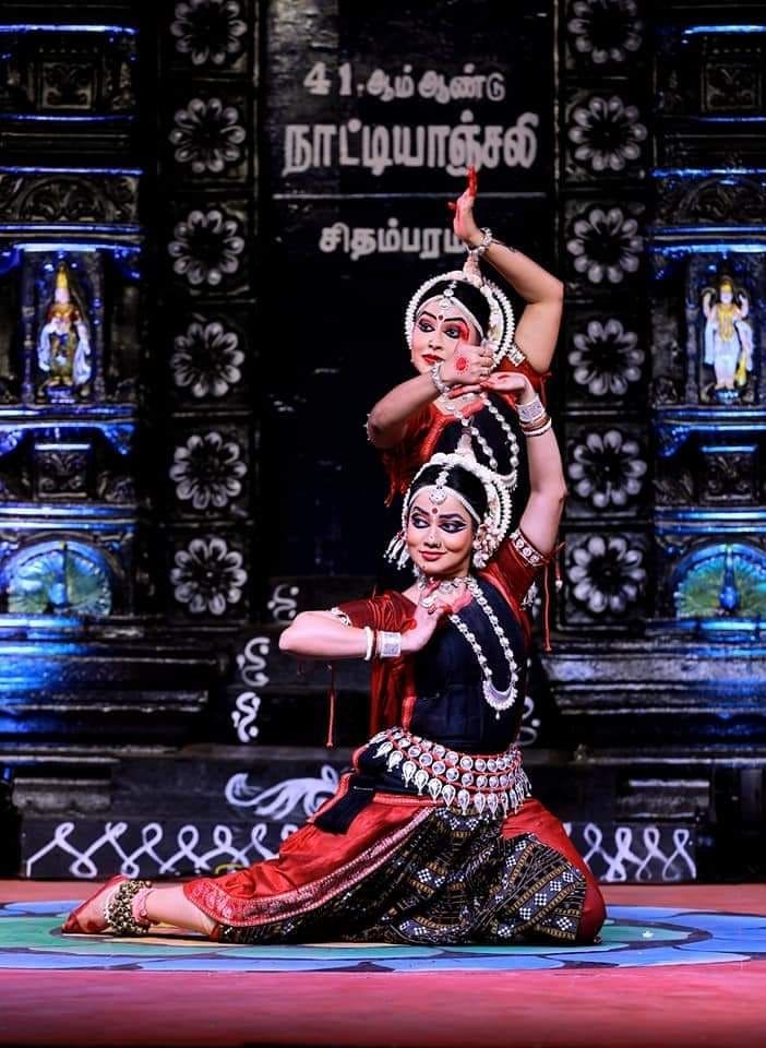 Traditional ceremony setup with intricate fabrics and colors