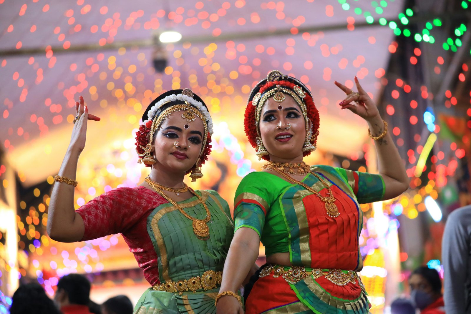 Traditional attire and jewelry displayed at an event